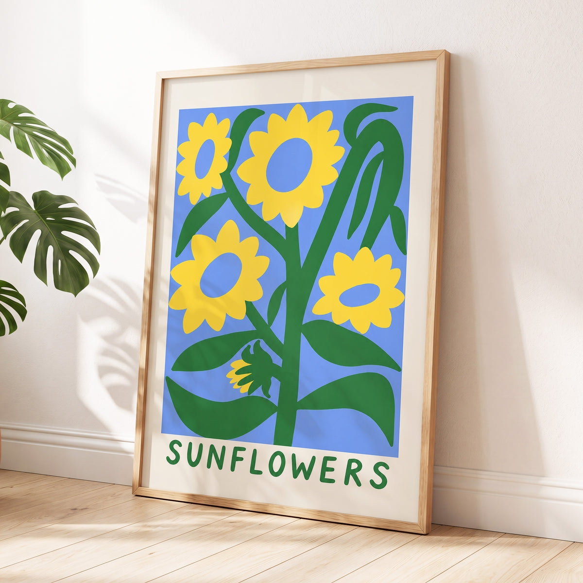 Sunflower Daydream, yellow, green, blue floral wall art displayed in a styled interior, gallery view 6