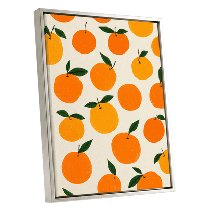 Sunlit Citrus Scatter, orange, yellow, green nature wall art shown as a silver framed canvas wall art