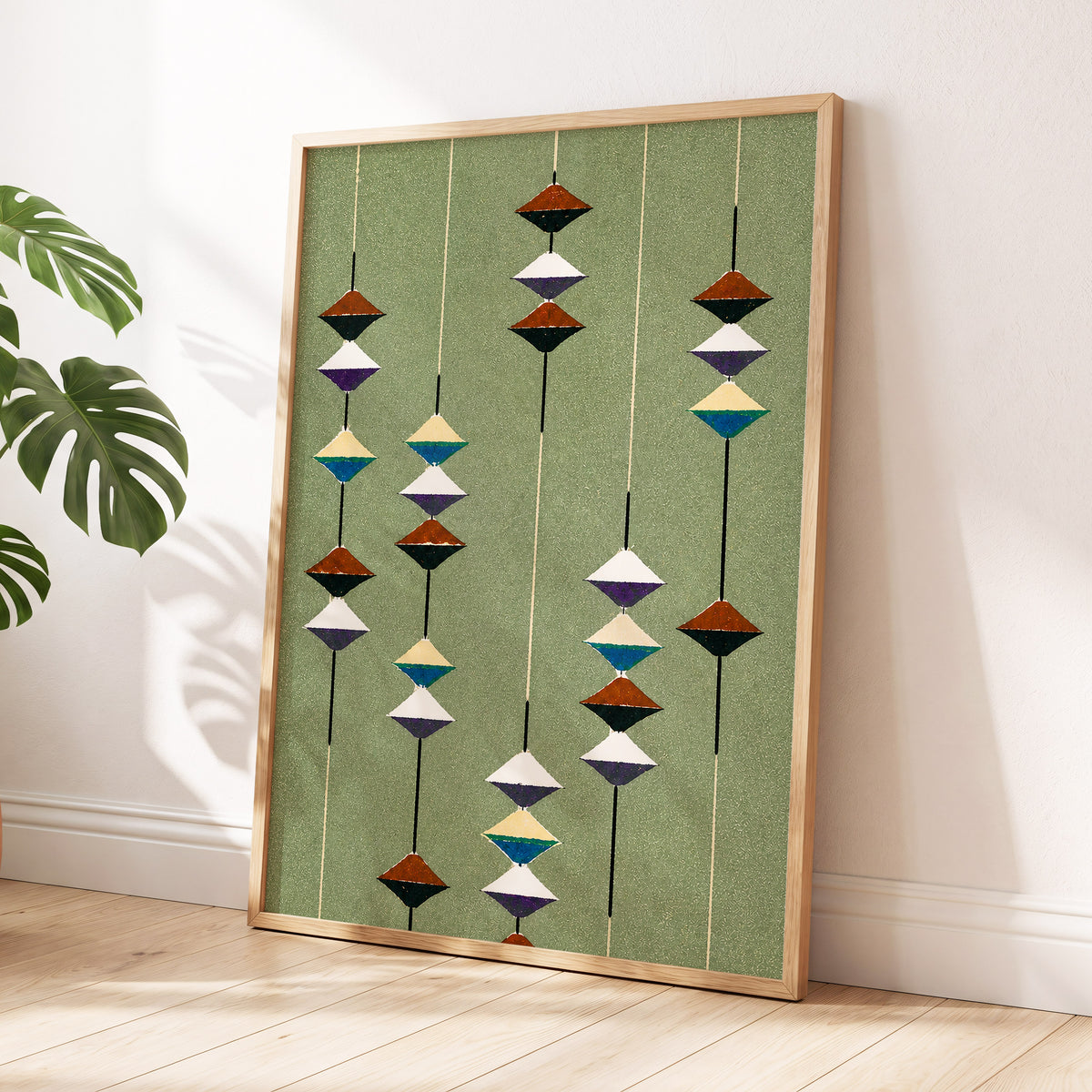 Suspended Rhythm, green, black, white abstract wall art displayed in a styled interior, gallery view 2