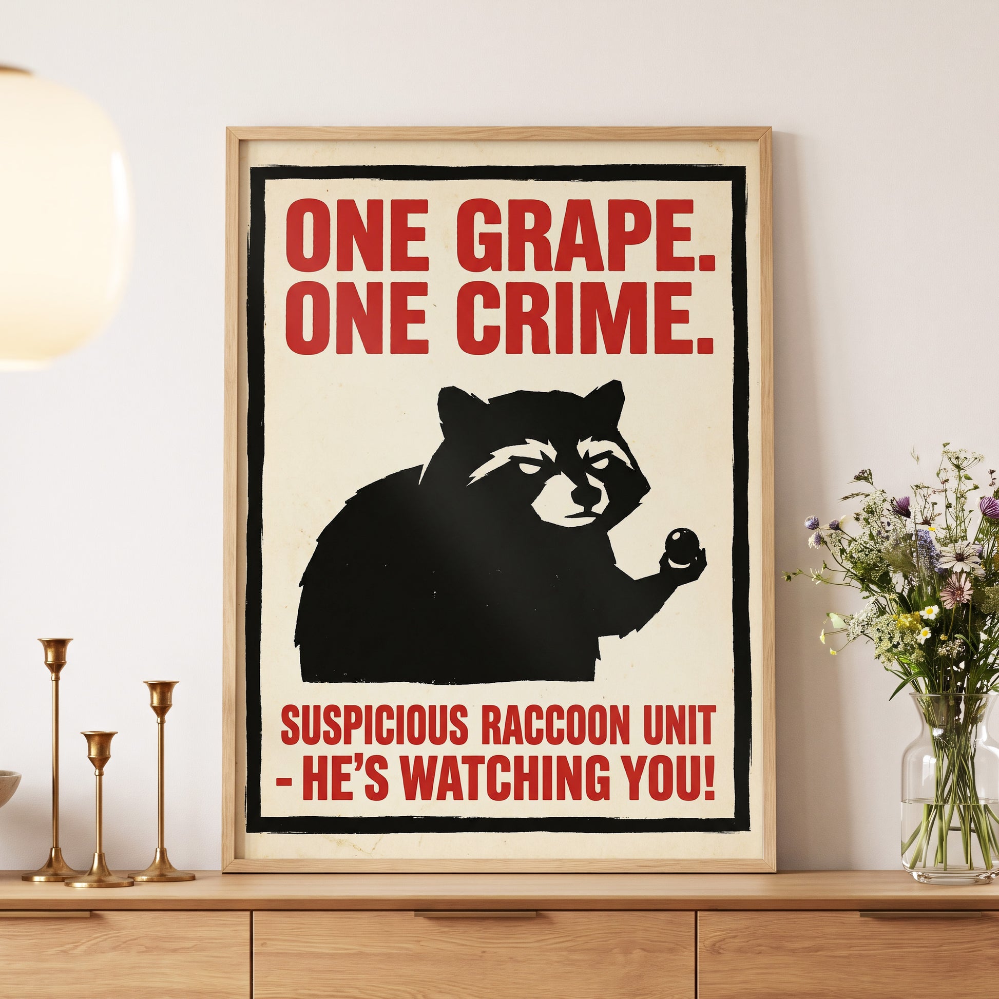 Suspicious Raccoon Unit, black, beige, red nature wall art displayed in a styled interior, gallery view 5