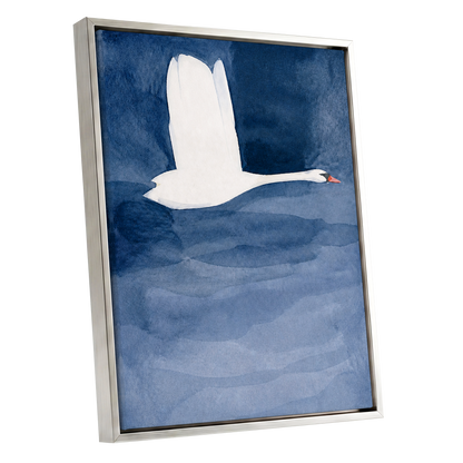 Swan in Blue Silence, blue, white, black nature wall art shown as a silver framed canvas wall art