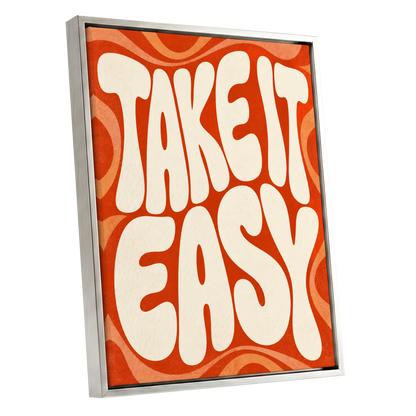Take It Easy Groove, orange, beige abstract wall art shown as a silver framed canvas wall art