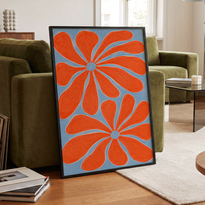 Tangerine Bloom, orange, blue, white floral wall art displayed in a styled interior, gallery view 2