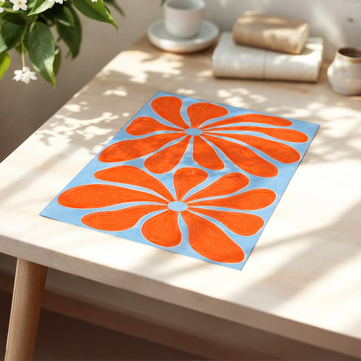 Tangerine Bloom, orange, blue, white floral wall art displayed in a styled interior, gallery view 5