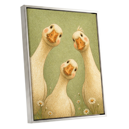 The Curious Goose Trio, green, beige, white nature wall art shown as a silver framed canvas wall art
