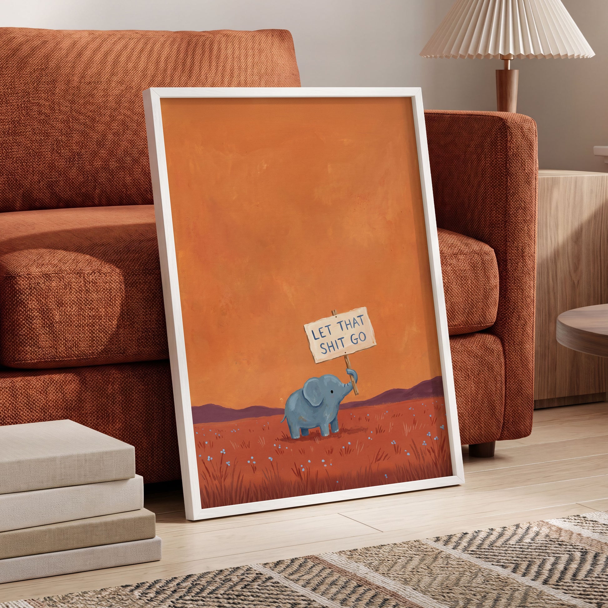 The Let-Go Elephant, orange, red, blue nature wall art displayed in a styled interior, gallery view 2