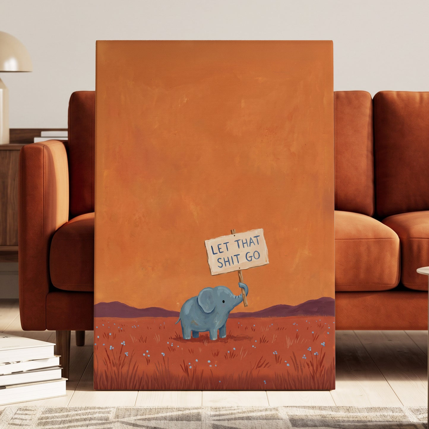 The Let-Go Elephant, orange, red, blue nature wall art displayed in a styled interior, gallery view 3