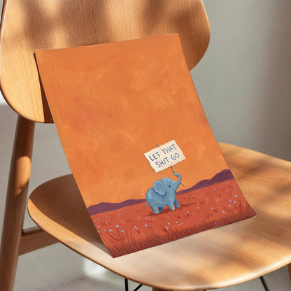 The Let-Go Elephant, orange, red, blue nature wall art displayed in a styled interior, gallery view 5