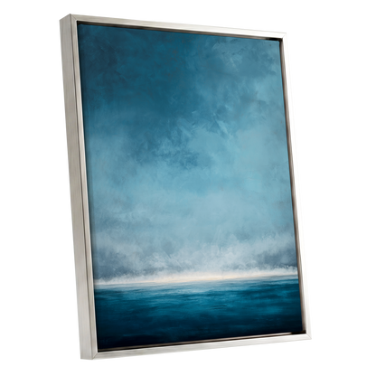 Tide Beyond Silence, blue, white, gray nature wall art shown as a silver framed canvas wall art