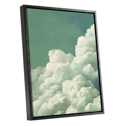 Verdant Cloudscape, green, white, blue nature wall art shown as a black framed canvas wall art