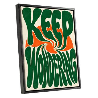Wonder in a Whirl, green, orange, beige abstract wall art shown as a black framed canvas wall art