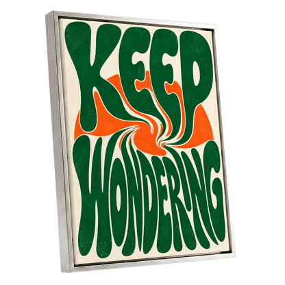 Wonder in a Whirl, green, orange, beige abstract wall art shown as a silver framed canvas wall art